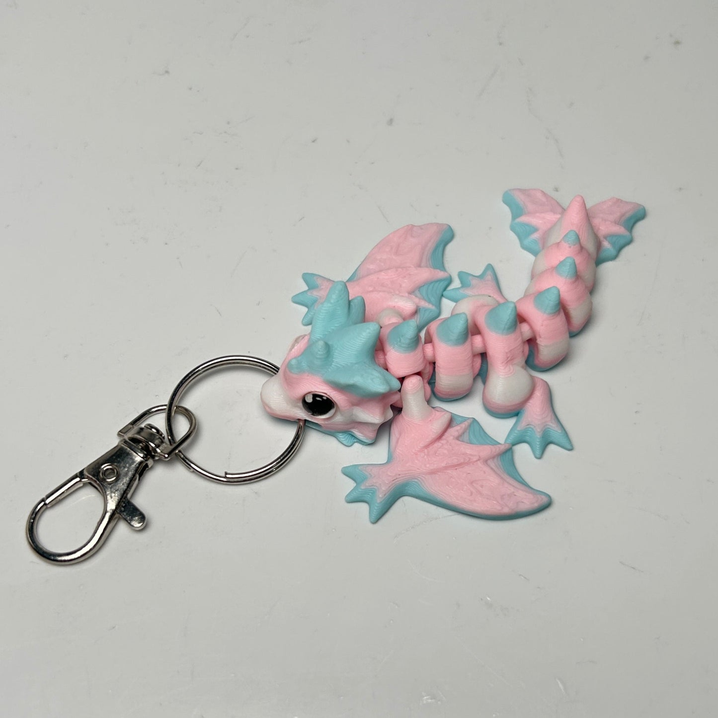 Rainbow dragon keychain articulated keychain pendant, toy school bag, car small hanger